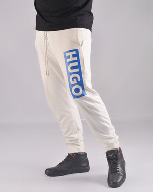 HUGO COTTON-TERRY TRACKSUIT BOTTOMS WITH LOGO PRINT