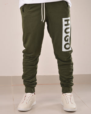 HUGO COTTON-TERRY TRACKSUIT BOTTOMS WITH LOGO PRINT OLIVE