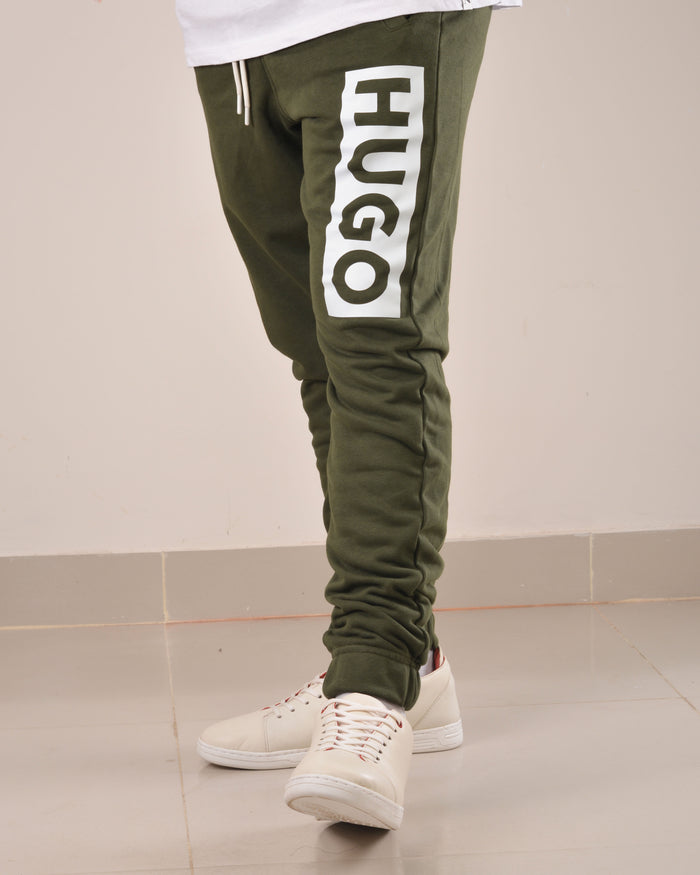 HUGO COTTON-TERRY TRACKSUIT BOTTOMS WITH LOGO PRINT OLIVE